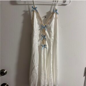 Elegant White Nightgown with Blue Bow Accents